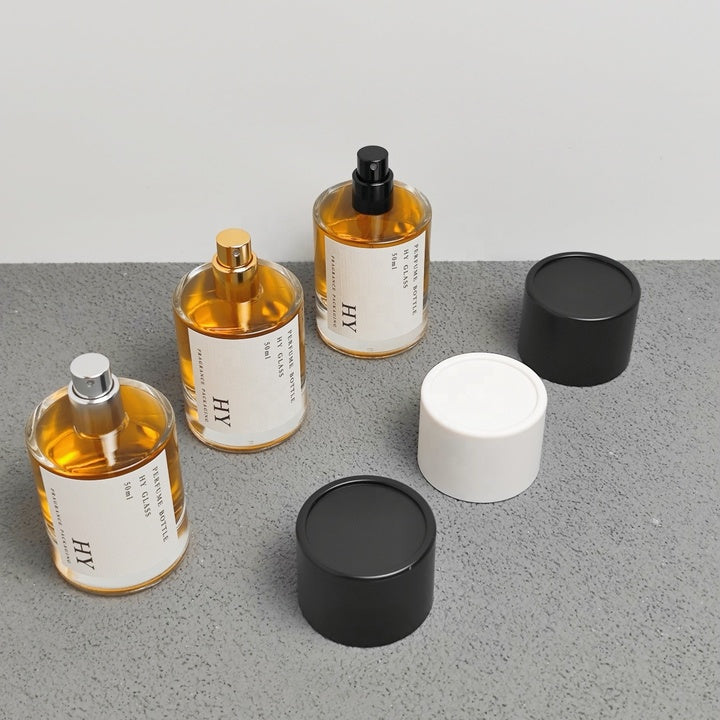 High Quality 50ml Crimp Neck Cylinder Glass Perfume Bottle Minimalist Black and White Cylindrical Cap with Pump Sprayer