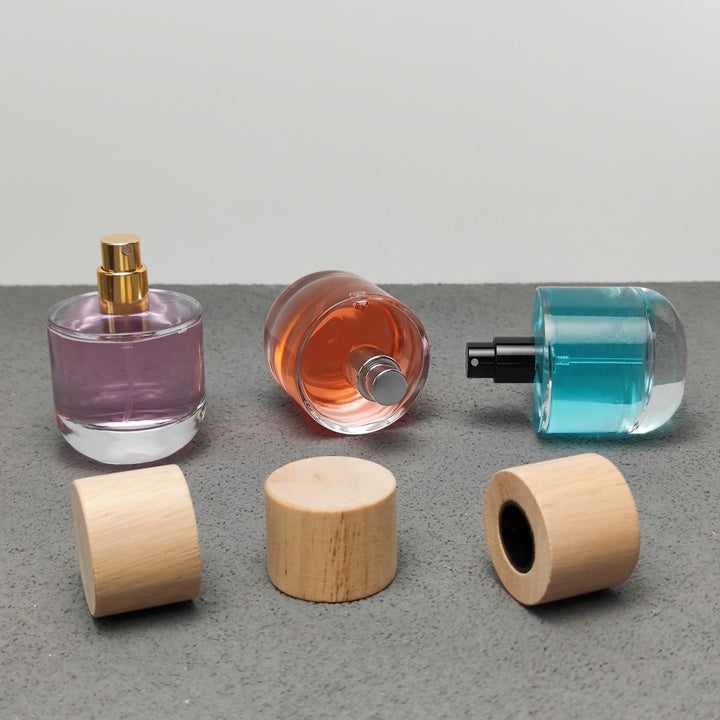 50ml & 100ml Cylinder Glass Perfume Bottles with Pump Sprayer and Stylish Caps for Home Boutique & Display