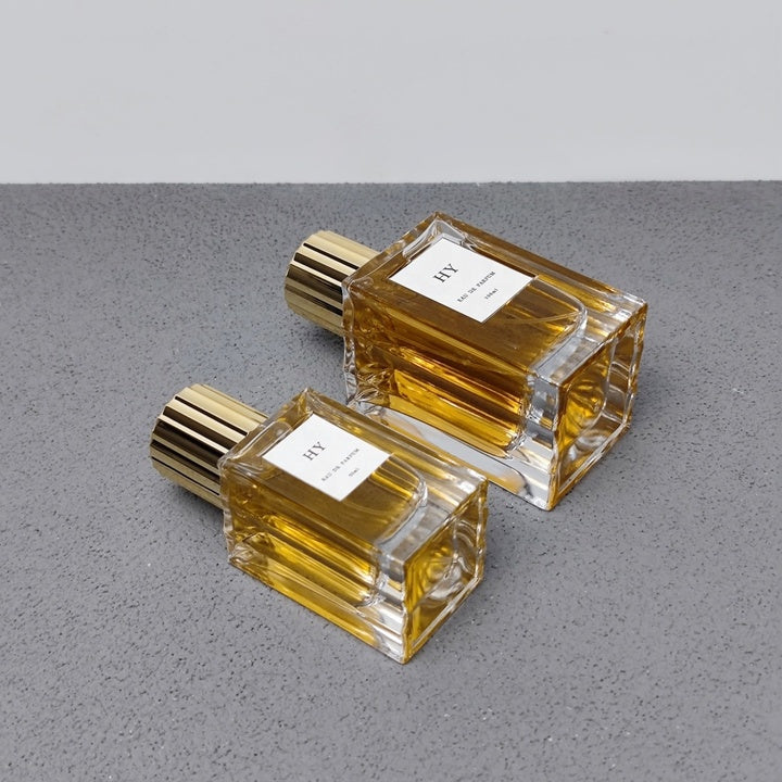 Premium Thick Glass 50ml 100ml Wavy Design Square Perfume Bottle Ribbed Gold Silver Vertical Stripe Cap Screen Printed Pump