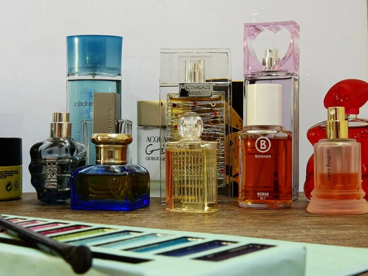 Perfume bottles with various colors, collisions, textures and cap decorations