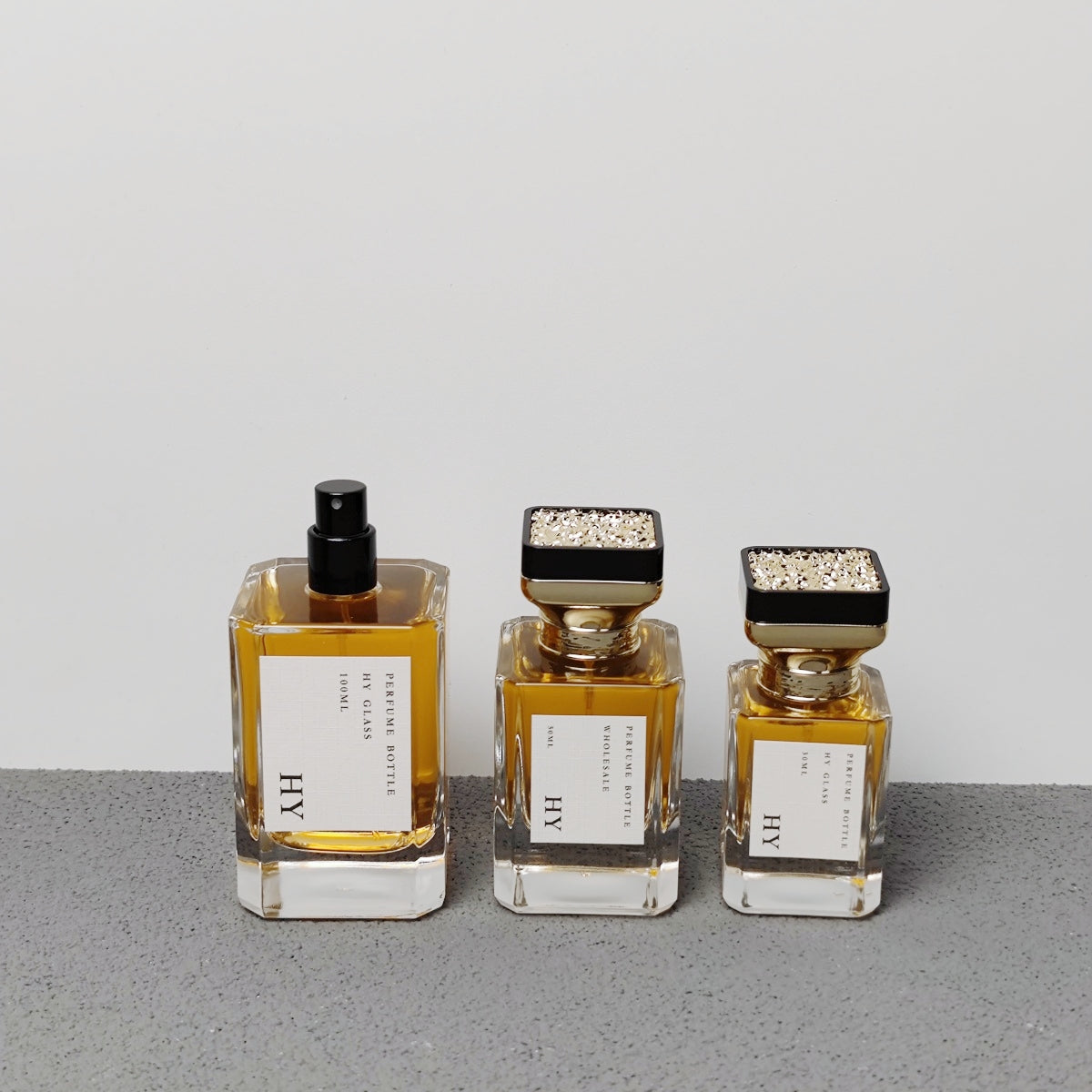 30ml 50ml 100ml Square Luxury Empty Perfume Cologne Bottle Crimp Neck with Atomizer and Unique Designed Gold Top Cap