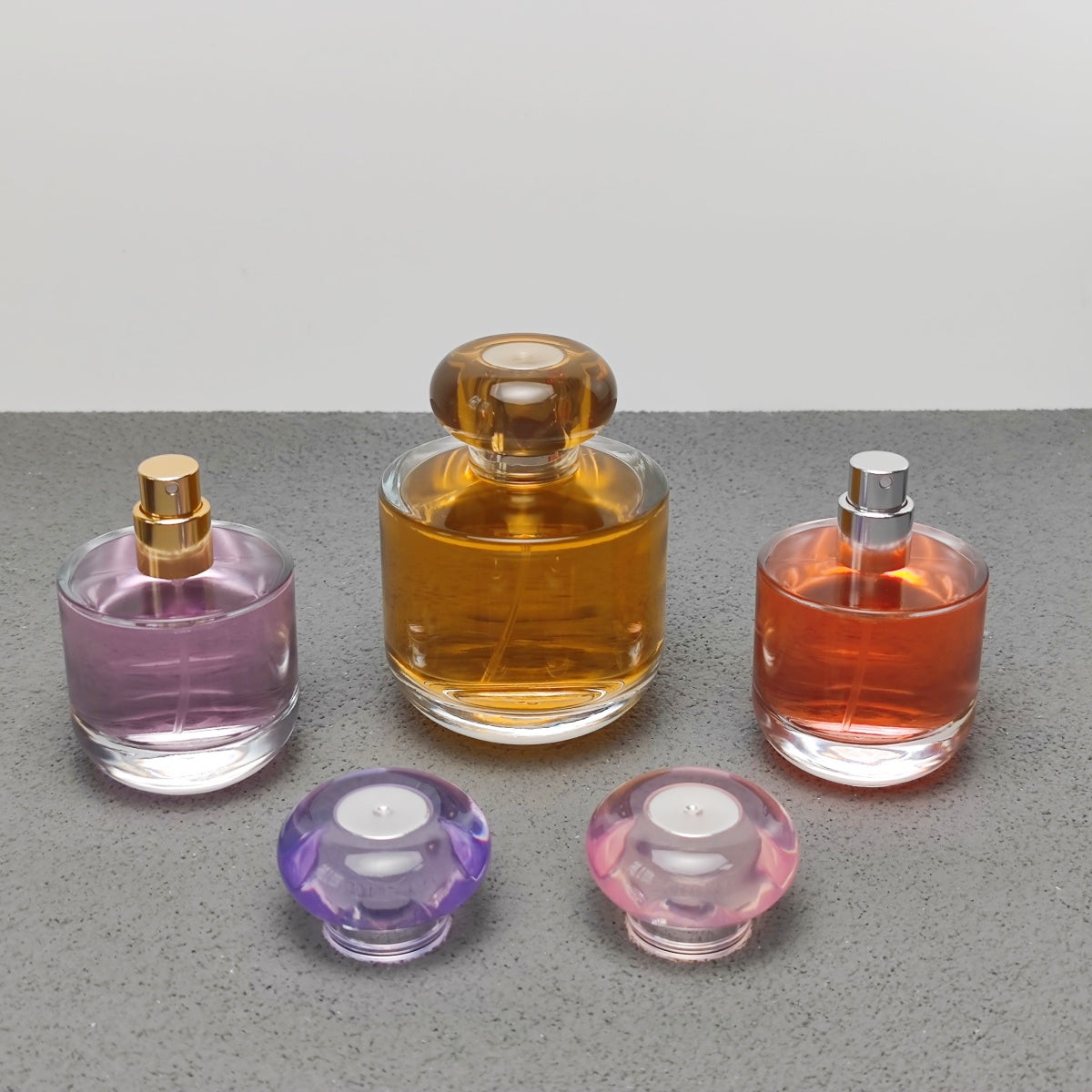 50ml & 100ml Cylinder Glass Perfume Bottles with Pump Sprayer and Stylish Caps for Home Boutique & Display