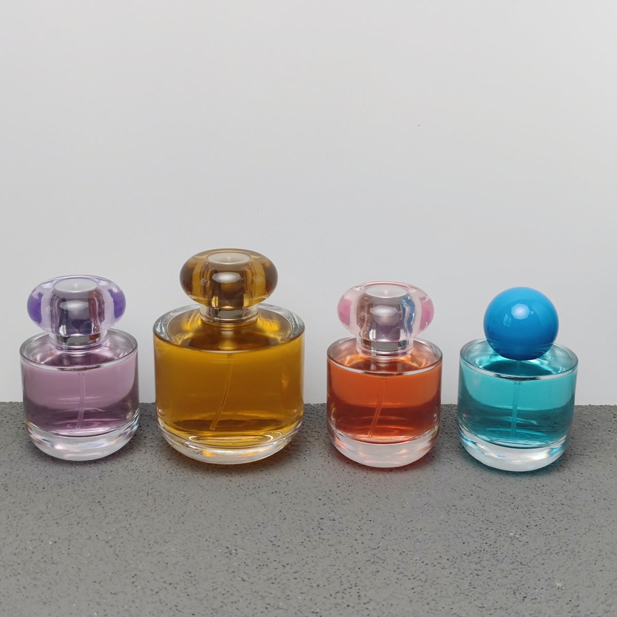 50ml & 100ml Cylinder Glass Perfume Bottles with Pump Sprayer and Stylish Caps for Home Boutique & Display