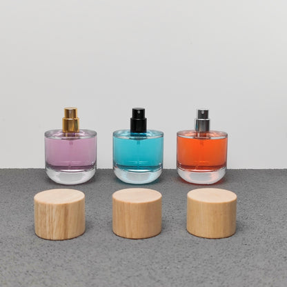 50ml & 100ml Cylinder Glass Perfume Bottles with Pump Sprayer and Stylish Caps for Home Boutique & Display