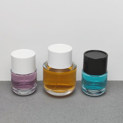 50ml & 100ml Cylinder Glass Perfume Bottles with Pump Sprayer and Stylish Caps for Home Boutique & Display