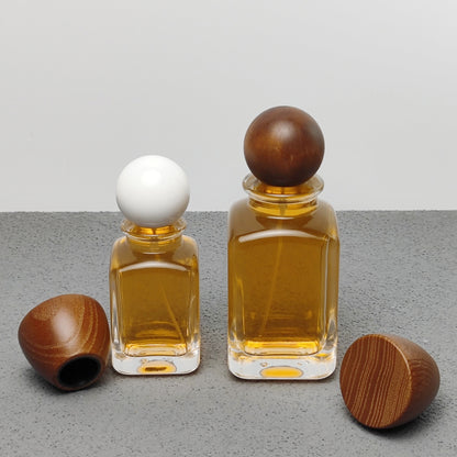 Luxury Unique Square Design 50ml 100ml Arabic Perfume Bottles with Crimp Atomizer and Wood Cap Screen Printing