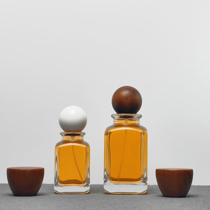 Luxury Unique Square Design 50ml 100ml Arabic Perfume Bottles with Crimp Atomizer and Wood Cap Screen Printing