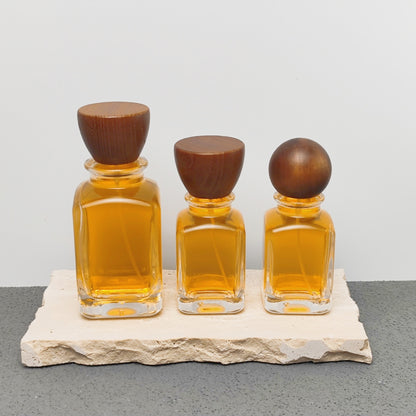 Luxury Unique Square Design 50ml 100ml Arabic Perfume Bottles with Crimp Atomizer and Wood Cap Screen Printing