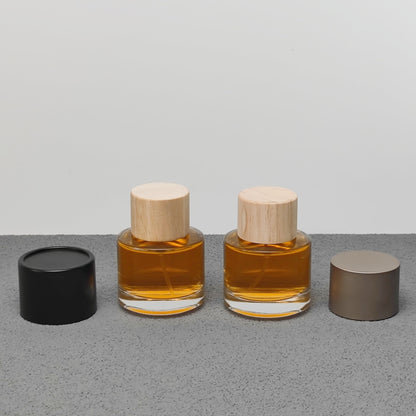 50ml Round Glass Perfume Bottle Crimp Neck Luxury Fragrance Packaging with Custom Cap OEM ODM Perfume Bottle Manufacturer