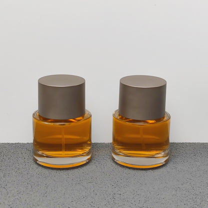 50ml Round Glass Perfume Bottle Crimp Neck Luxury Fragrance Packaging with Custom Cap OEM ODM Perfume Bottle Manufacturer