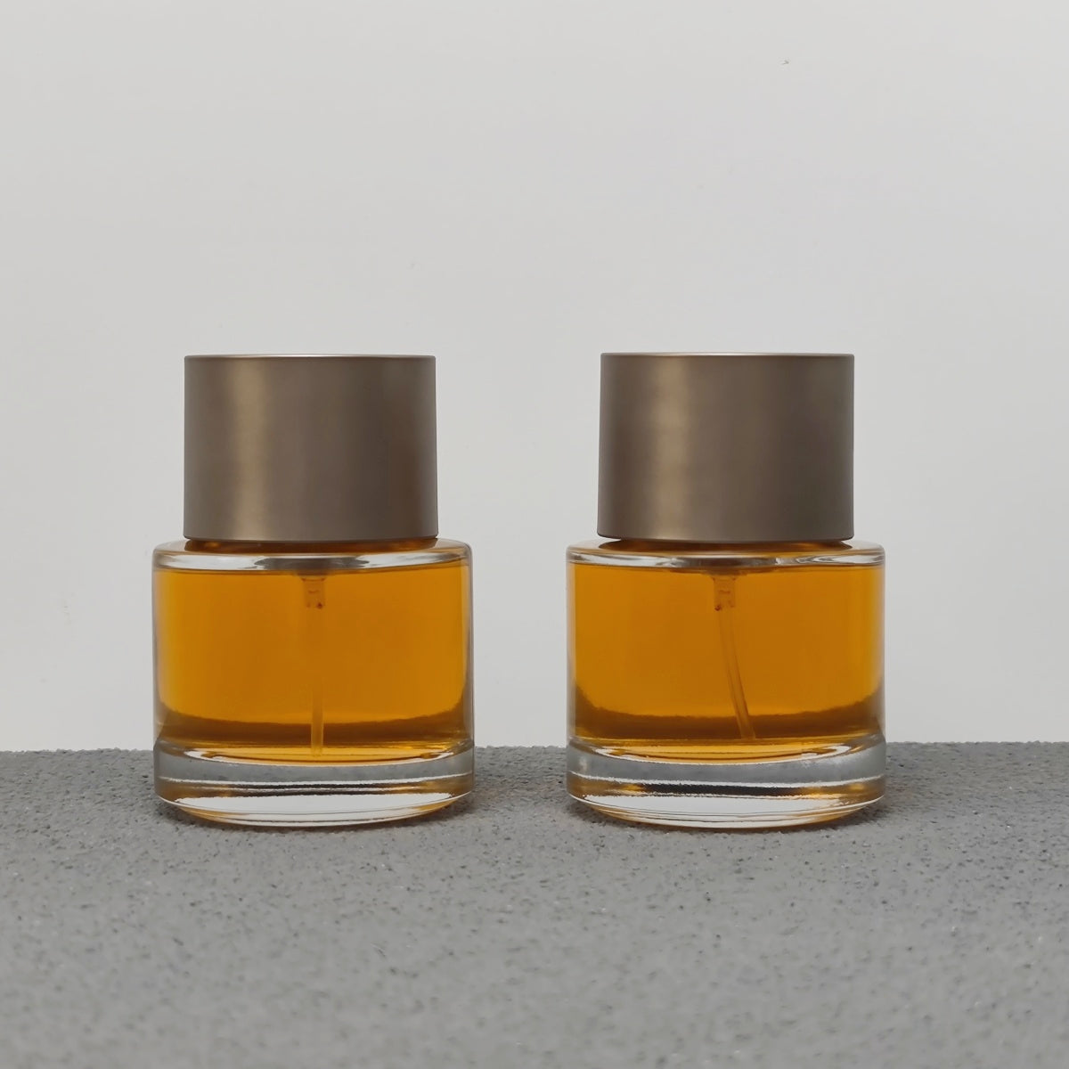 50ml Round Glass Perfume Bottle Crimp Neck Luxury Fragrance Packaging with Custom Cap OEM ODM Perfume Bottle Manufacturer