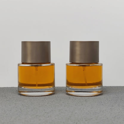 50ml Round Glass Perfume Bottle Crimp Neck Luxury Fragrance Packaging with Custom Cap OEM ODM Perfume Bottle Manufacturer