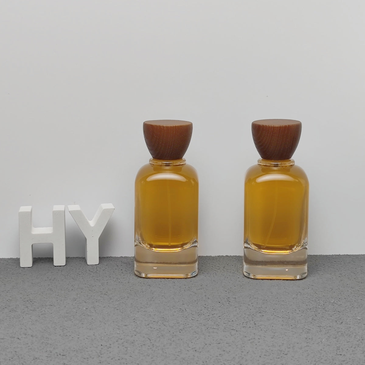 Wholesale 100ml Luxury Glass Fragrance Bottle with Decorative Glass Cap