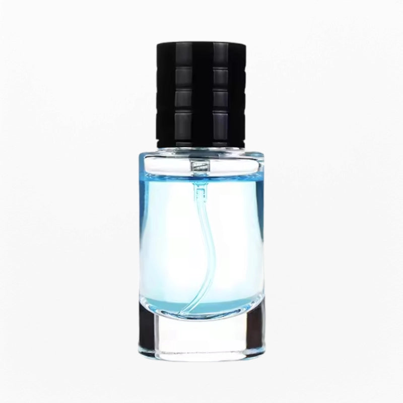 Clear glass cylinder perfume bottle with black cap