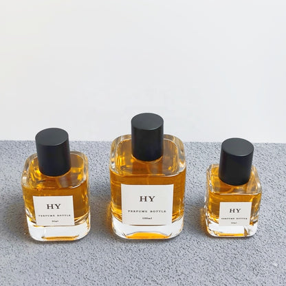 Wholesale High-End Elegant Square Thick Glass Perfume Bottles 30ml 50ml 100ml Crimp Type Matte Black Cap Pump Sprayer Sealing