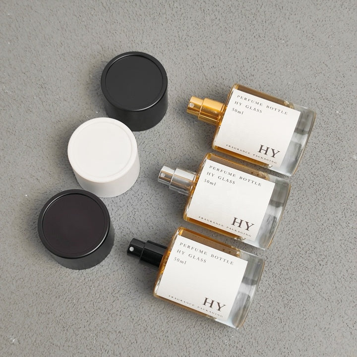 High Quality 50ml Crimp Neck Cylinder Glass Perfume Bottle Minimalist Black and White Cylindrical Cap with Pump Sprayer