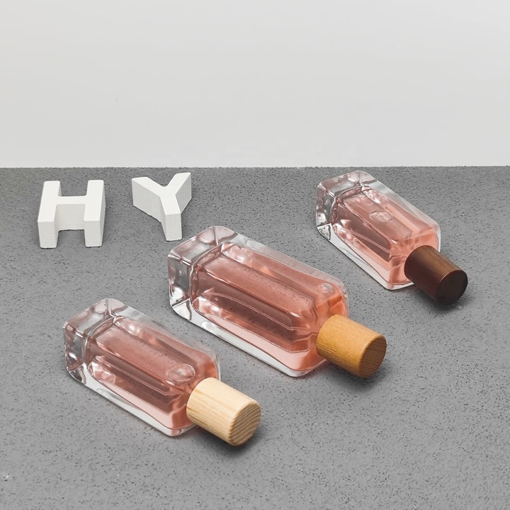 HY Glass 50ml 100ml Luxury Square Empty Perfume Glass Bottle with Spray Pump Plastic Cap or Wooden Cap for Fragrance Packaging