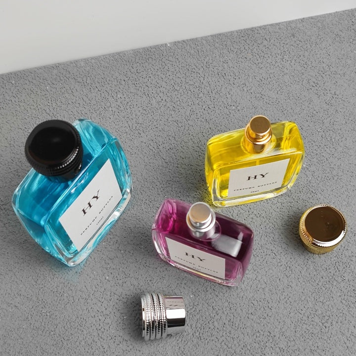 Luxury Flat Glass Perfume Spray Bottles 50ml 100ml Heavy Base Stock Bold Snake Caps Pump Crimp Neck Design Screen Printing