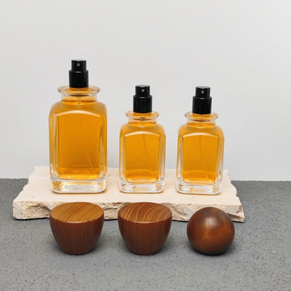 Luxury Unique Square Design 50ml 100ml Arabic Perfume Bottles with Crimp Atomizer and Wood Cap Screen Printing
