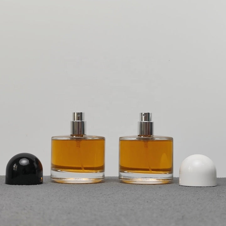 50ml Round Glass Perfume Bottle Crimp Neck Luxury Fragrance Packaging with Custom Cap OEM ODM Perfume Bottle Manufacturer