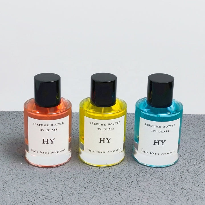 High Quality 50ml Minimalist Empty Glass Perfume Spray Bottle Crimp Neck and Black Cap with Pump Sealer