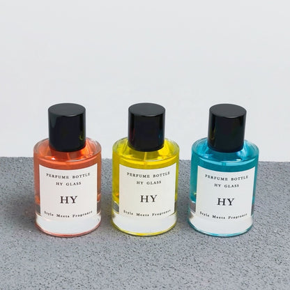High Quality 50ml Minimalist Empty Glass Perfume Spray Bottle Crimp Neck and Black Cap with Pump Sealer