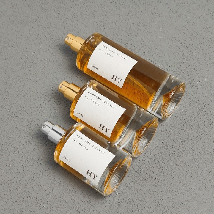Luxury Tall Cylinder Glass Perfume Bottles 30ml 50ml 100ml Unique Bottom with Pump Sprayer Atomizer and Gold Silver Caps