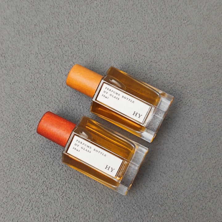 Custom 50ml Octagonal Thick Base Glass Perfume Bottle with Wood Cap Crimp Neck Perfume Container