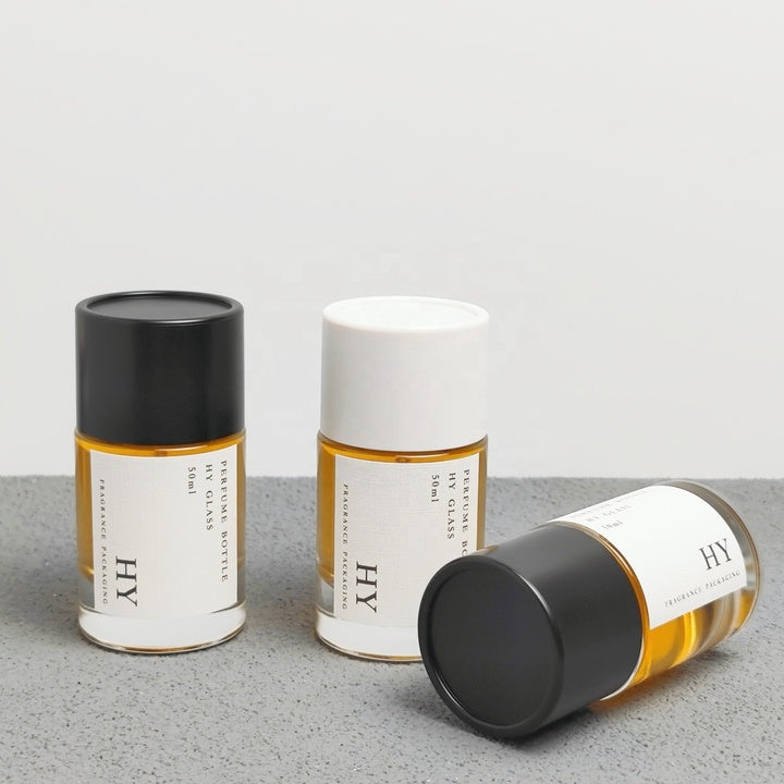 High Quality 50ml Crimp Neck Cylinder Glass Perfume Bottle Minimalist Black and White Cylindrical Cap with Pump Sprayer
