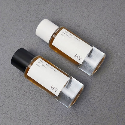 Custom 80ml Luxury Glass Transparent Cylinder Perfume Bottle Minimalist Black White Caps Screen Printing Pump Sprayer Wholesale