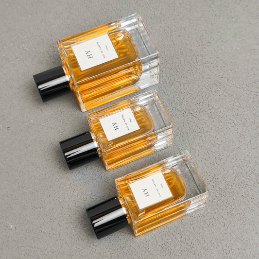 Unique Wave Designed Square Thick Glass Perfume Bottles 50ml 100ml Crimp Type with Labeling Area and Pump Sprayer Sealing