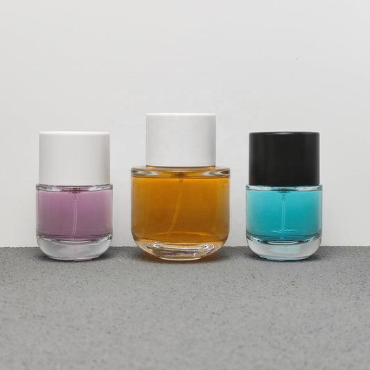 50ml & 100ml Cylinder Glass Perfume Bottles with Pump Sprayer and Stylish Caps for Home Boutique & Display