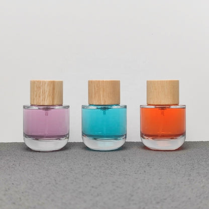 50ml & 100ml Cylinder Glass Perfume Bottles with Pump Sprayer and Stylish Caps for Home Boutique & Display