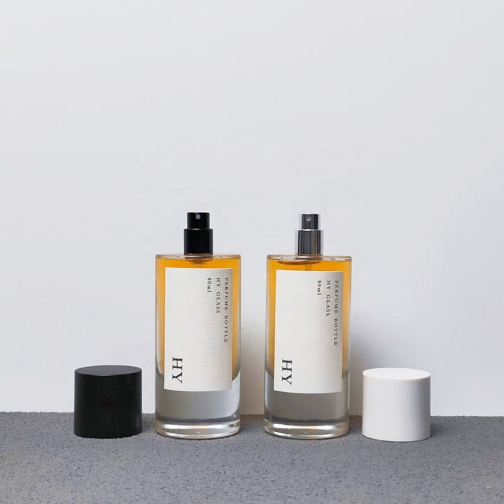 Custom 80ml Luxury Glass Transparent Cylinder Perfume Bottle Minimalist Black White Caps Screen Printing Pump Sprayer Wholesale