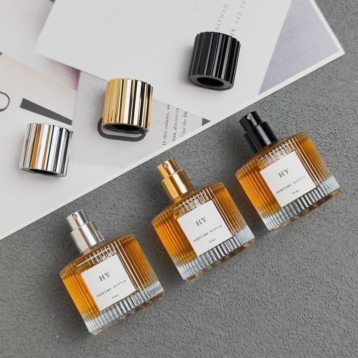Recyclable 40ml Short Cylinder Glass Perfume Bottle with Ribbed Gold/Silver/Black Cap Empty and Sealed with Pump Sprayer