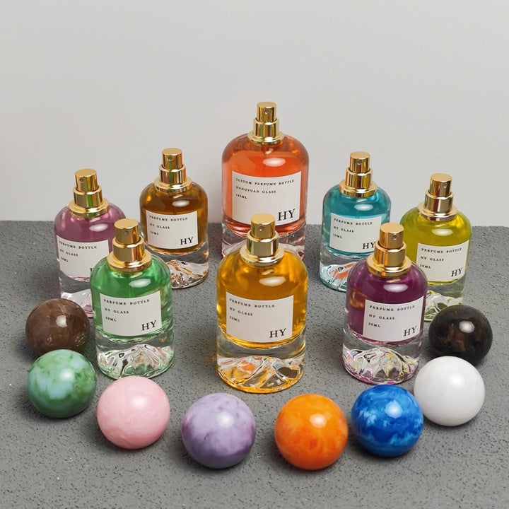 Wholesale Artistic Marble Pattern Oval Glass Perfume Bottle 30ml 50ml 100ml Mountain Bottom Design with Pump Sprayer Ball Cap