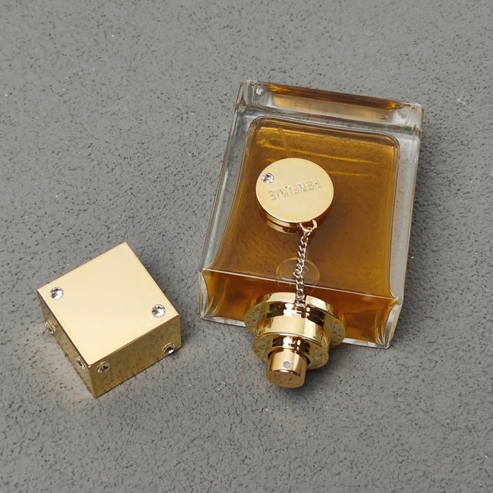 Luxury Perfume Bottle 100ml with Gold Cap and Chain for Women Custom Packaging Box Available