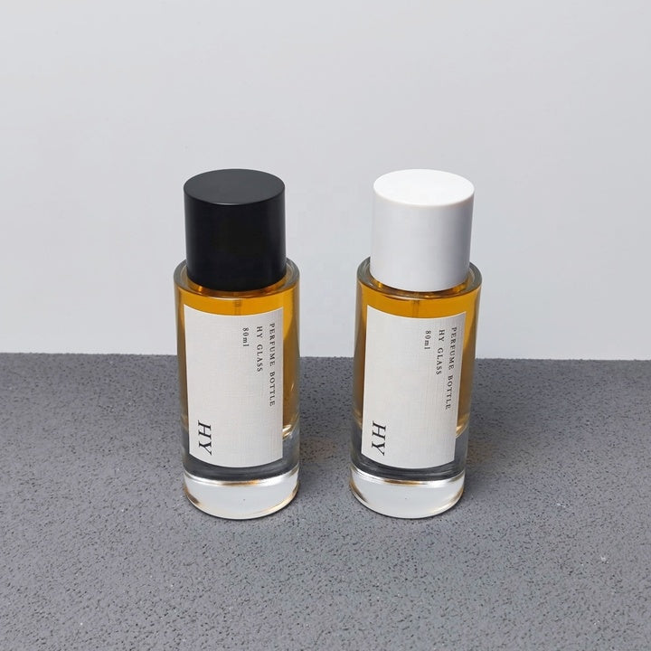 Custom 80ml Luxury Glass Transparent Cylinder Perfume Bottle Minimalist Black White Caps Screen Printing Pump Sprayer Wholesale
