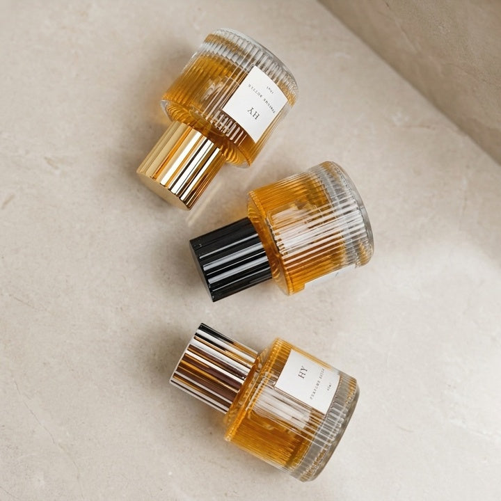 Recyclable 40ml Short Cylinder Glass Perfume Bottle with Ribbed Gold/Silver/Black Cap Empty and Sealed with Pump Sprayer