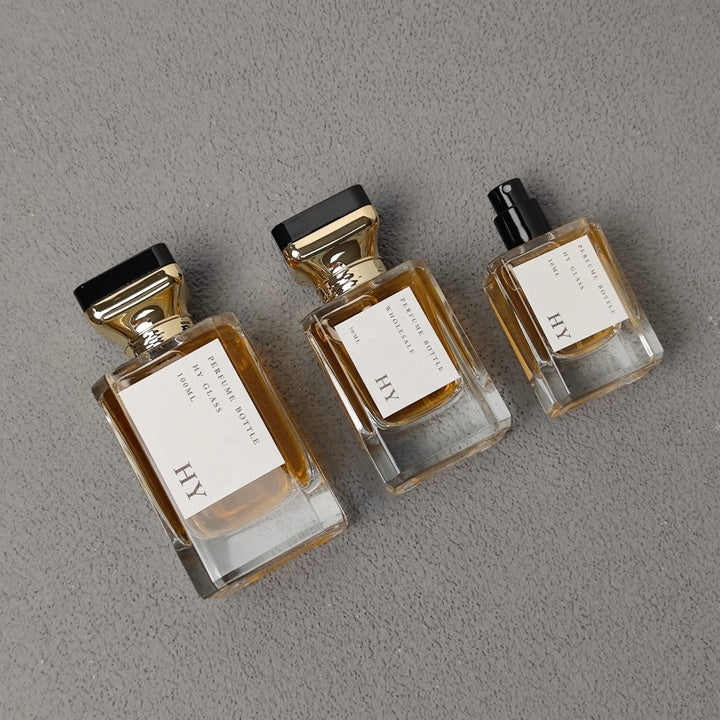 30ml 50ml 100ml Square Luxury Empty Perfume Cologne Bottle Crimp Neck with Atomizer and Unique Designed Gold Top Cap