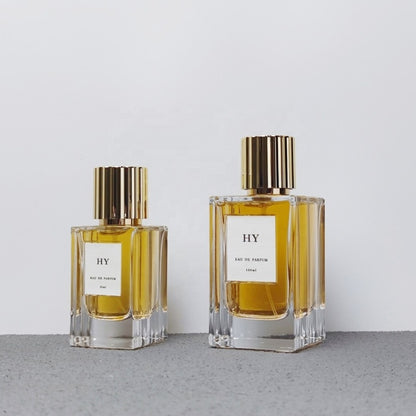 Premium Thick Glass 50ml 100ml Wavy Design Square Perfume Bottle Ribbed Gold Silver Vertical Stripe Cap Screen Printed Pump