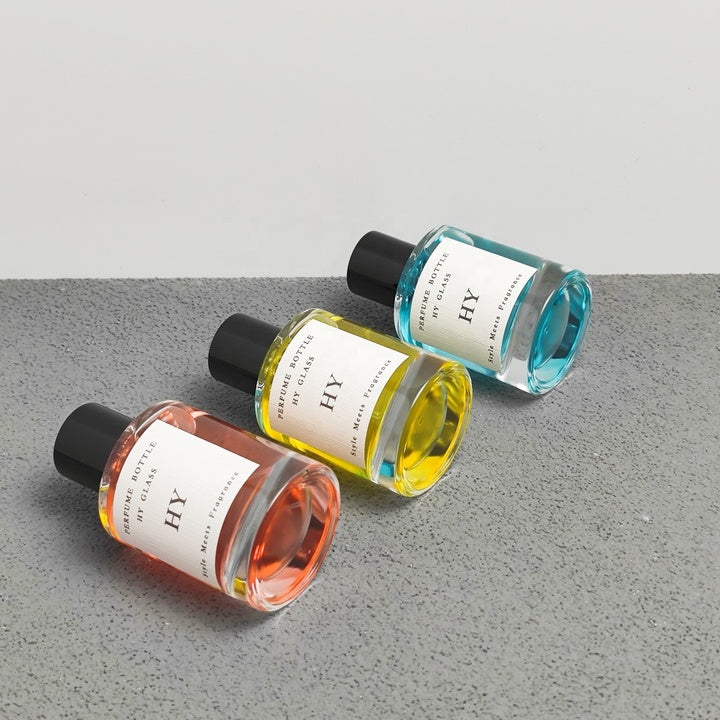 High Quality 50ml Minimalist Empty Glass Perfume Spray Bottle Crimp Neck and Black Cap with Pump Sealer