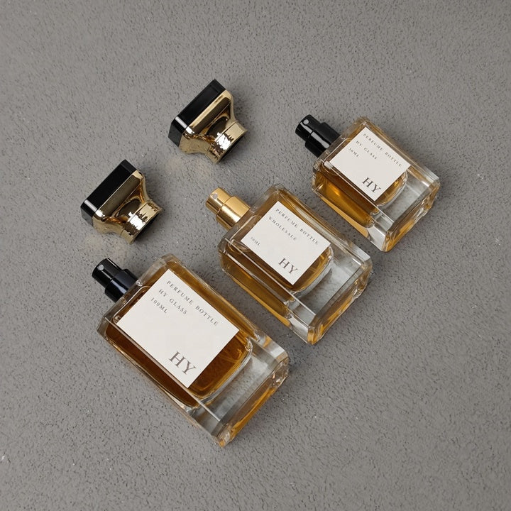 30ml 50ml 100ml Square Luxury Empty Perfume Cologne Bottle Crimp Neck with Atomizer and Unique Designed Gold Top Cap