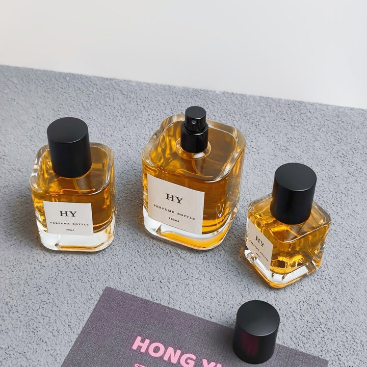 Wholesale High-End Elegant Square Thick Glass Perfume Bottles 30ml 50ml 100ml Crimp Type Matte Black Cap Pump Sprayer Sealing