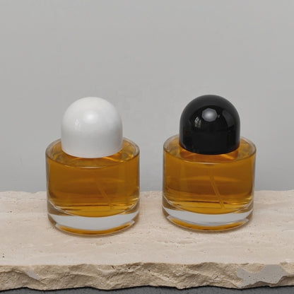 50ml Round Glass Perfume Bottle Crimp Neck Luxury Fragrance Packaging with Custom Cap OEM ODM Perfume Bottle Manufacturer