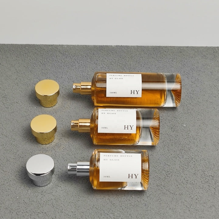Luxury Tall Cylinder Glass Perfume Bottles 30ml 50ml 100ml Unique Bottom with Pump Sprayer Atomizer and Gold Silver Caps