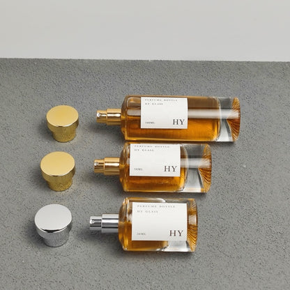 Luxury Tall Cylinder Glass Perfume Bottles 30ml 50ml 100ml Unique Bottom with Pump Sprayer Atomizer and Gold Silver Caps