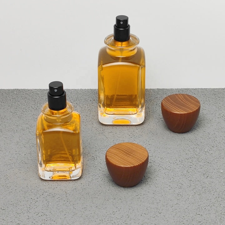 Luxury Unique Square Design 50ml 100ml Arabic Perfume Bottles with Crimp Atomizer and Wood Cap Screen Printing