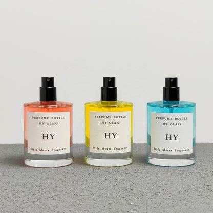High Quality 50ml Minimalist Empty Glass Perfume Spray Bottle Crimp Neck and Black Cap with Pump Sealer