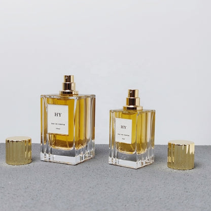 Premium Thick Glass 50ml 100ml Wavy Design Square Perfume Bottle Ribbed Gold Silver Vertical Stripe Cap Screen Printed Pump